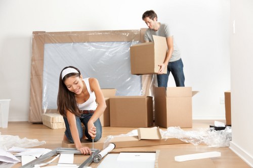 Flat removals in Belsize Park with moving boxes in a residential street