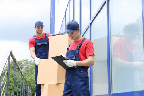 House removalists planning a move in Belsizepark on a residential street