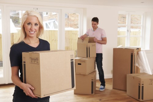 Moving team loading household items for a Belsize Park relocation