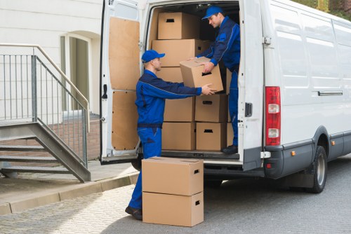 Professional piano removals in Belsizepark with protective wrapping