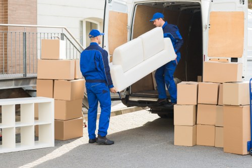 Removal team preparing a protected move with safety equipment