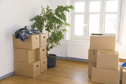 Packed moving boxes ready for removal services in Belsizepark