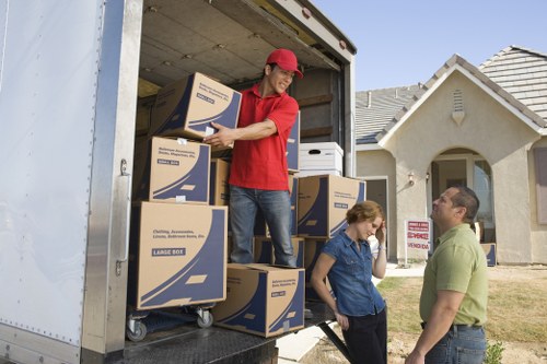Packing and loading items for a man and van move in Belsizepark