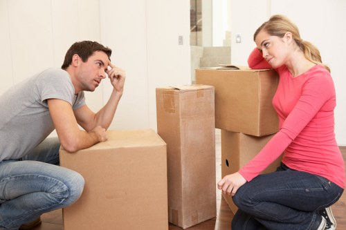 Protected furniture and boxed belongings arranged securely during a move