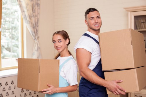 Careful packing of fragile items for relocation
